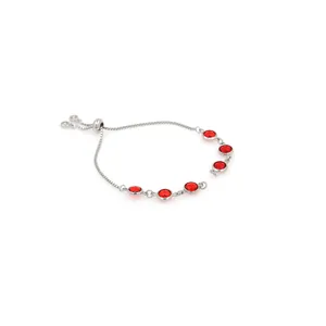 Detail of adjustable silver box chain bracelet with six vibrant red zircon stones
