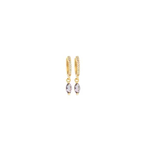 Close-up of 18K gold earrings with marquise purple gems and pavé zircon accents