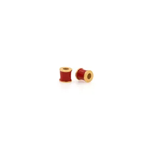 Detail of red enamel cylinder beads with 18K gold plated edges for DIY jewelry making