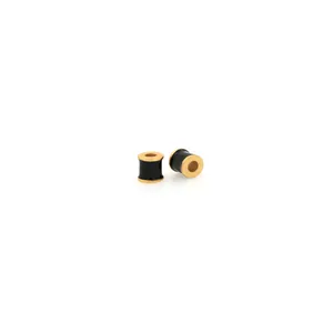 Detail view of 18K gold plated cylindrical beads with black enamel for DIY jewelry