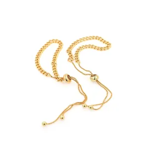 Adjustable 18K gold plated Cuban chain bracelet with slide clasp on white background