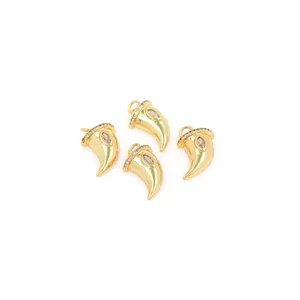 Set of four 18K gold plated horn pendants with micro-paved cubic zirconia stones
