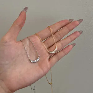 Elegant S925 sterling silver smile necklace with sparkling zircons in gold and silver