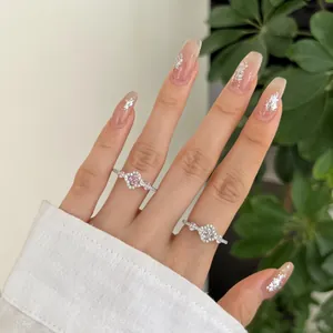 S925 sterling silver rings with flower clover design and pink zircon stone on hand