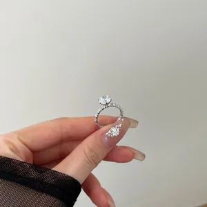 Close-up of S925 silver ring featuring a large zircon stone and twisted rope band
