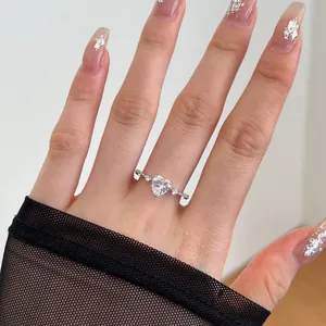 Close-up of elegant S925 sterling silver heart ring with sparkling cubic zirconia stones