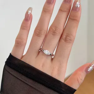 Close-up of s925 silver ring featuring marquise-cut zircon on finger for women