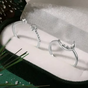 Macro view of S925 sterling silver moon ring set with zircon on velvet jewelry box