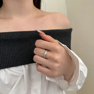 S925 sterling silver starry ring worn by a model showing sparkling texture and micro-inlays