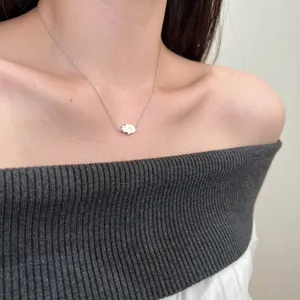 Elegant S925 sterling silver Hamsa Hand necklace with zircon on female collarbone