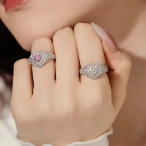 Macro di anelli a cuore in argento con zirconi rosa e bianchi incastonati a pavé lucido