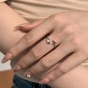 S925 sterling silver open ring featuring creative airplane and heart charms on model
