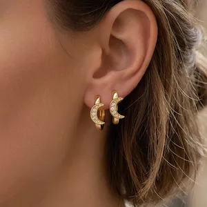 Chic gold-plated crescent moon hoop earrings with pavé cubic zirconia gemstones