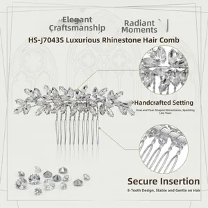 Macro detail of silver bridal hair comb featuring marquise and pear cut crystals