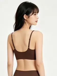 Detail of a dark brown seamless bra with thin straps and a U-shaped back design