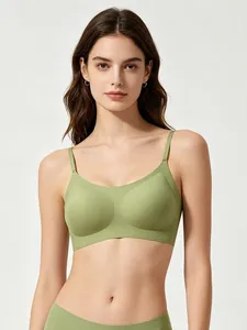 Detail of avocado green seamless wireless bra with thin straps and smooth elastic fabric