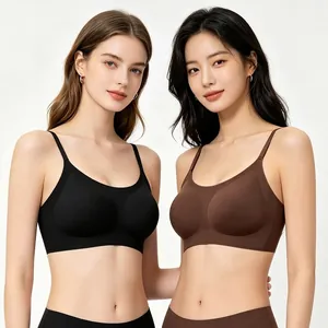 Minimalist seamless bra with thin straps and U-neck detail in black and brown colors