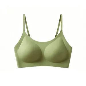 Detail view of avocado green seamless bra with adjustable straps and molded pads