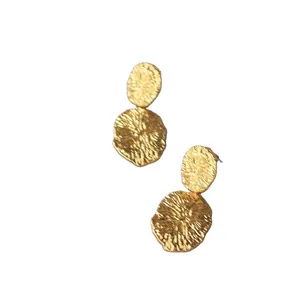 Minimalist gold hammer-textured double disc earrings with a bohemian handmade finish