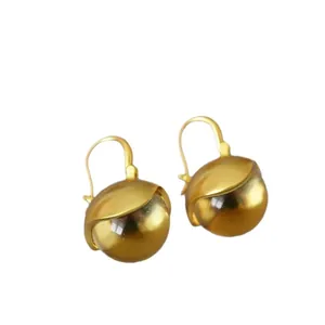 Vintage brushed gold bud-shaped earrings with crystal glass sphere on white background