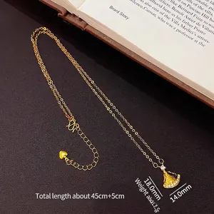 Elegant gold fan-shaped necklace with zircon accents and an adjustable O-chain design