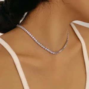 Close-up of a 925 sterling silver tennis necklace with 4mm cubic zirconia on a model