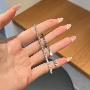 Detail of S925 sterling silver tennis bracelet with 5A cubic zirconia stones on a hand