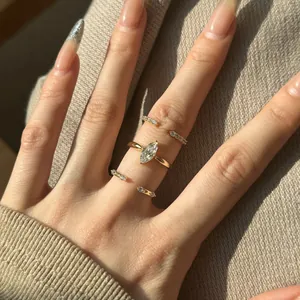 Close-up of S925 silver marquise cut zircon stacking ring set on hand in natural sunlight
