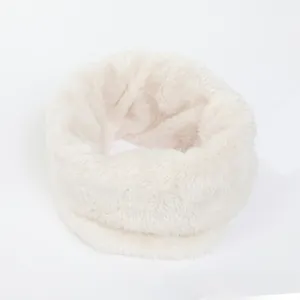 Close-up of fluffy white faux fur neck warmer showing soft plush texture for winter