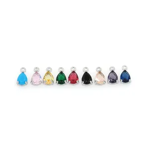 Set of nine teardrop-shaped 18K gold-plated pendants with colorful zircon gemstones