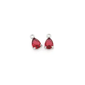 Detail of red teardrop gemstone charms with silver-plated claw setting for jewelry making