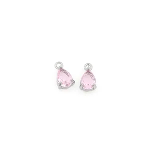 Detailed close-up of pear-cut pink gemstones in silver-plated three-prong settings