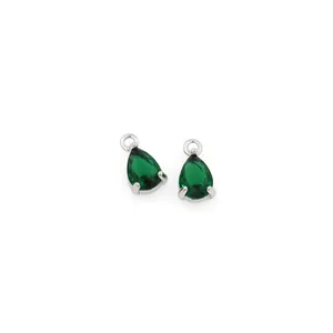 Detail of 18K gold-plated teardrop pendant with micro-pave green zircon and silver hook
