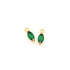 Macro shot of 18K gold plated emerald green marquise cut crystal pendant for DIY jewelry