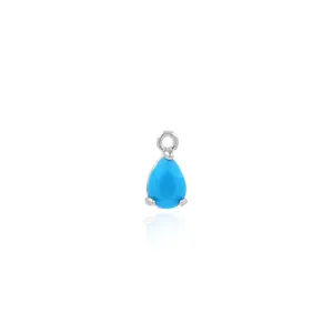 Close-up of 18K gold plated teardrop pendant with sky blue gemstone and zirconia