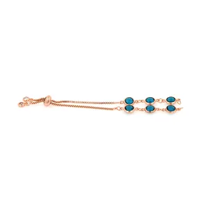 Bracelet plaqué or rose 18K avec cristaux bleu foncé et fermoir coulissant ajustable