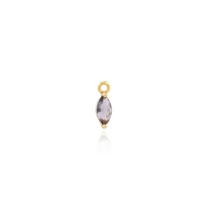 Macro detail of 18K gold-plated marquise-cut purple gemstone pendant with closed bail