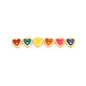 Detail of 18K gold-plated heart lockets with colorful enamel and Sweet engraving
