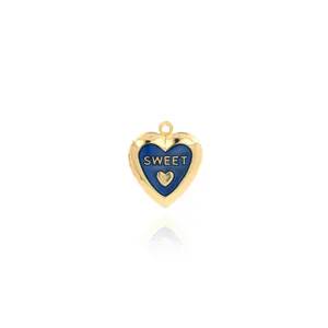 Detail of blue enamel heart locket with gold plating and SWEET engraving