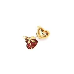 Ciondolo a cuore apribile placcato oro 18K in smalto rosso con fiocco dorato
