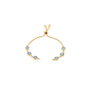18K gold-plated slider bracelet featuring six round blue gemstones and adjustable clasp