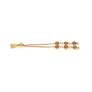 Detail of 18K gold plated friendship bracelet with brown beads and sliding slider clasp