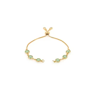 Detail of adjustable 18K gold plated bracelet featuring six round light green stones