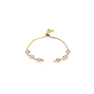 Detail of 18K gold plated bracelet with purple gems and adjustable slider clasp