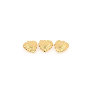 Three 18K gold plated heart-shaped lockets with ornate scroll edges for jewelry making