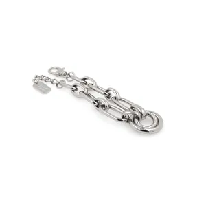 Close-up of silver chunky chain bracelet with lobster clasp and Good Luck charm
