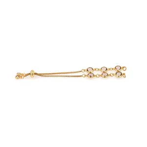 Detail of 18K gold-plated adjustable chain bracelet featuring six pink crystal gemstones