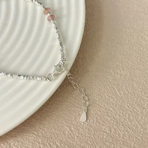 Detail of S925 sterling silver beaded bracelet with lobster clasp and extension chain