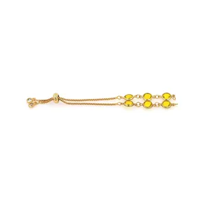 Detail of 18K gold plated adjustable bolo bracelet with sparkling yellow gemstones