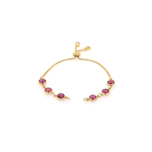 Detail showing an 18K gold plated box chain bracelet with six purple gemstones and slider
